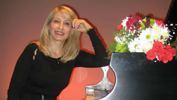 Ludmila teaching piano